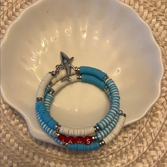 Blue and White Beaded Bracelet with Red Letter Accents Spelling Jaws - Picture 3 of 5